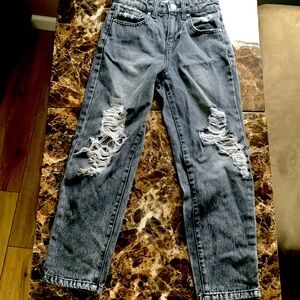 A black pair of jeans, kind of baggy at the end